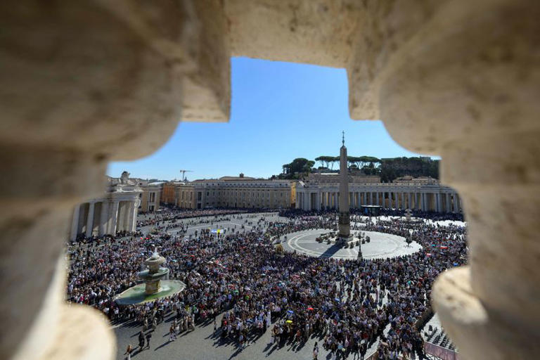 Faithful gather as Pope Leo (not pictured) leads the Angelus prayer from the window of the Apostolic Palace at the Vatican, October 11, 2026. Vatican Media/Elisabetta Trevisan/­Handout via REUTERS