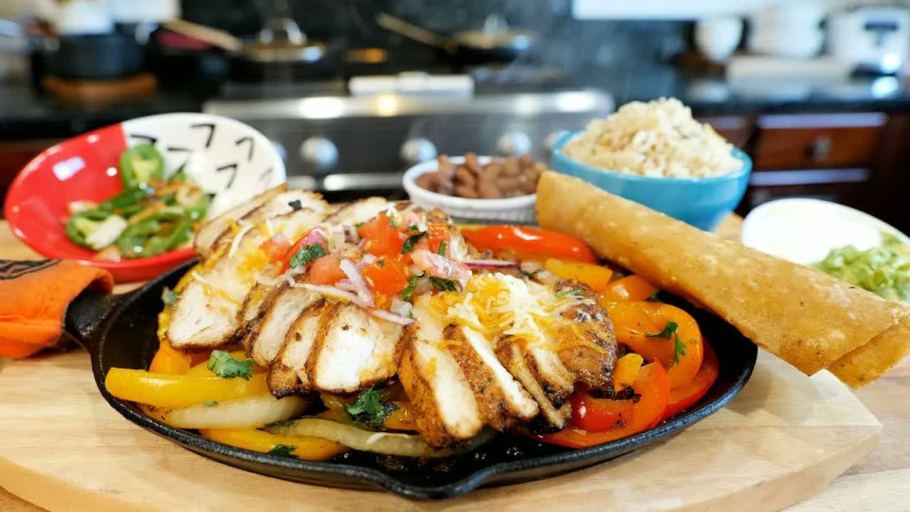 Tex-Mex chicken fajitas and seasoned rice you'll want to make again