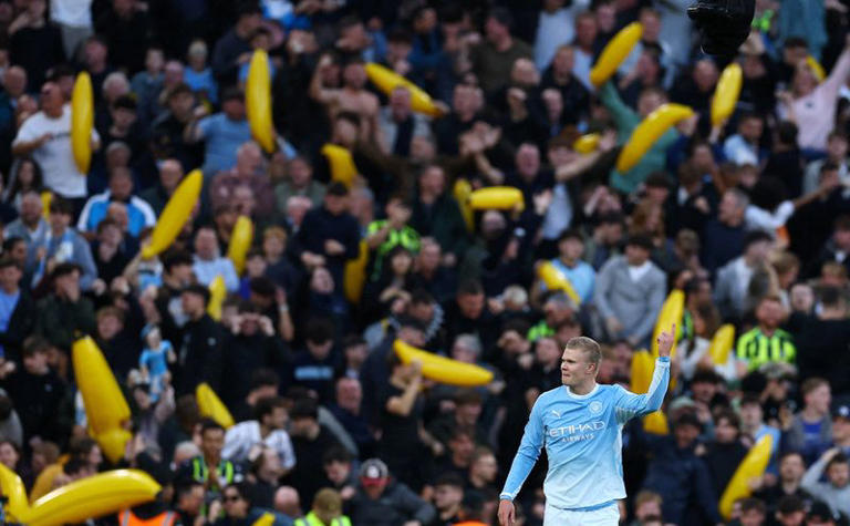 Soccer-Man City silence hostile Anfield with 3-0 win over Liverpool