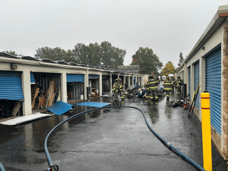 Officials investigate fire at storage facility in Newington