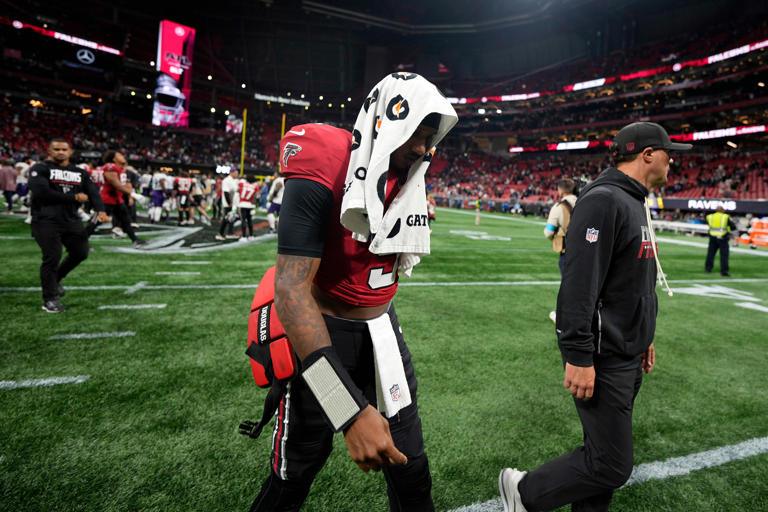 Atlanta Falcons quarterback Michael Penix Jr. walks off the field after a NFL football game against the Baltimore Ravens, Sunday, Oct. 11, 2026, in Atlanta. (AP Photo/Mike Stewart)