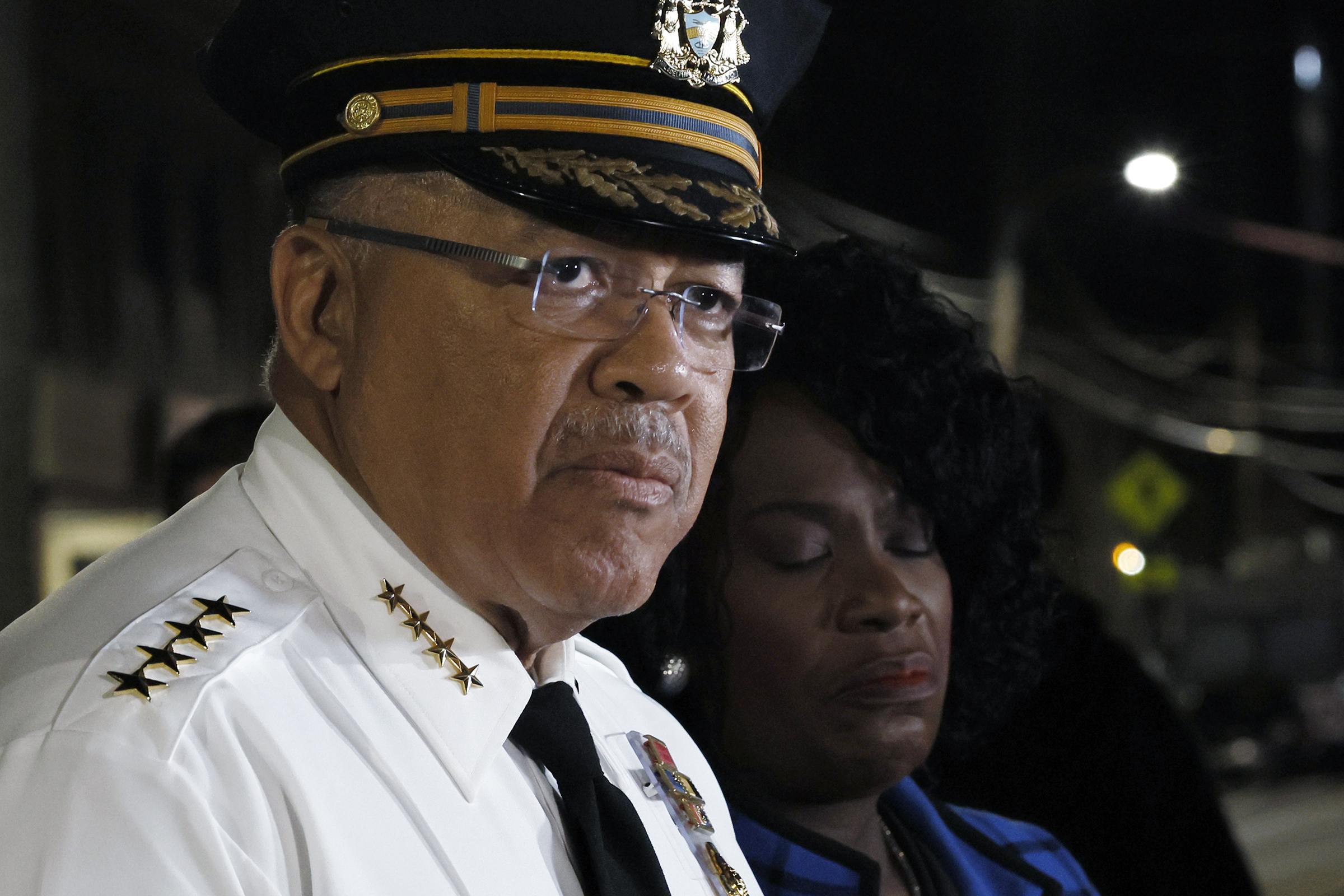 How a brief conversation on a West Philadelphia porch left one officer dead, and another seriously wounded