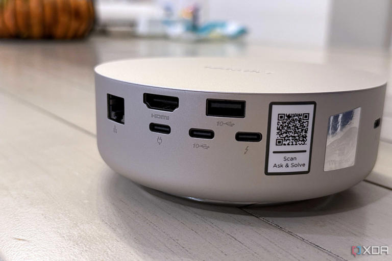 Lenovo's tiny AI PC ditches the box, and it's the smartest form factor ...