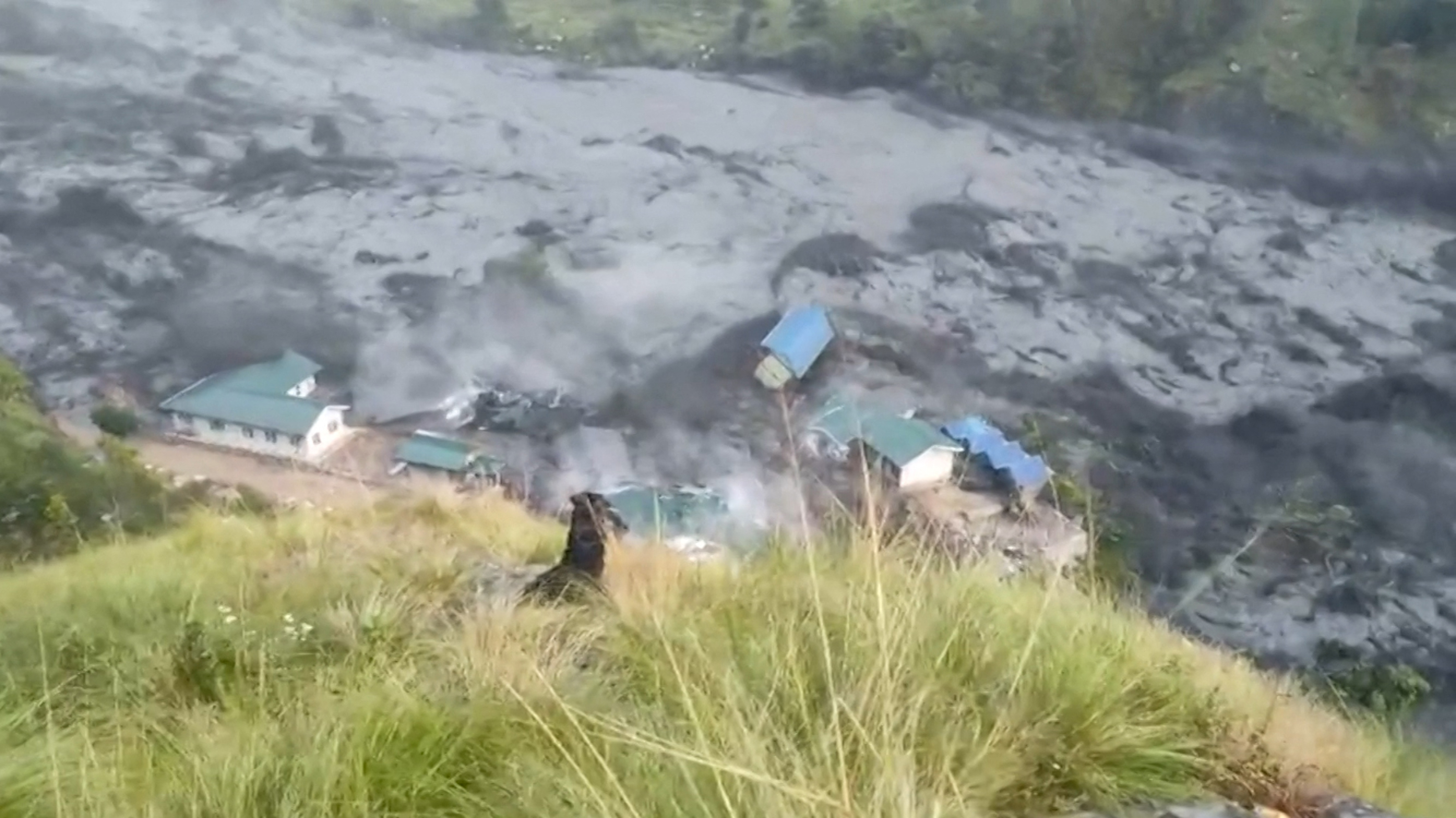 At least five people missing as flash floods in Nepal sweep away houses
