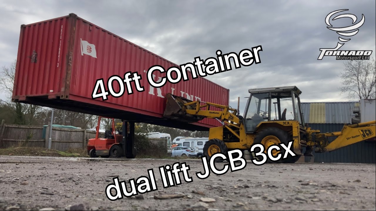 Moving a 40ft shipping container with heavy machinery