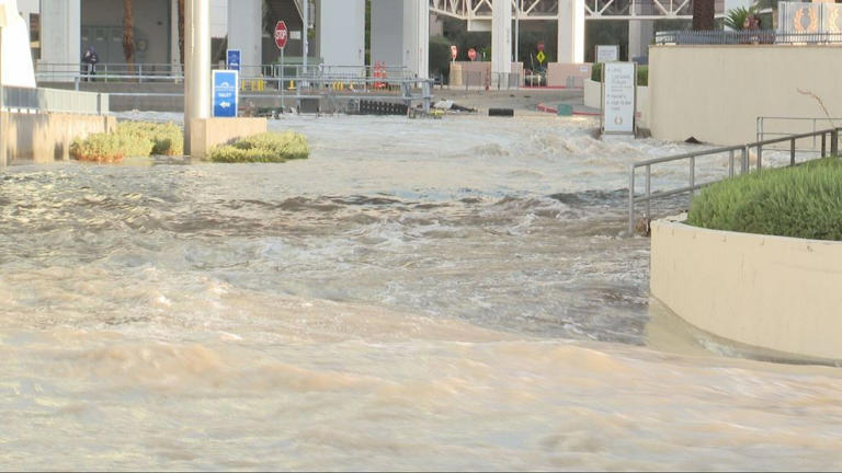 Flash flooding sends water rushing through streets near Las Vegas Strip