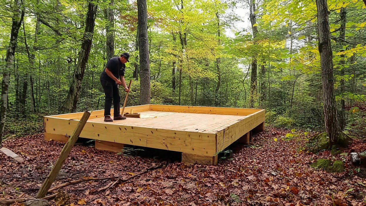 Building an off-grid log cabin in the woods: Step-by-step forest shelter