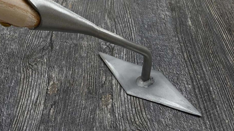 Forget digging: The easy-to-use tool for removing weeds from gravel ...