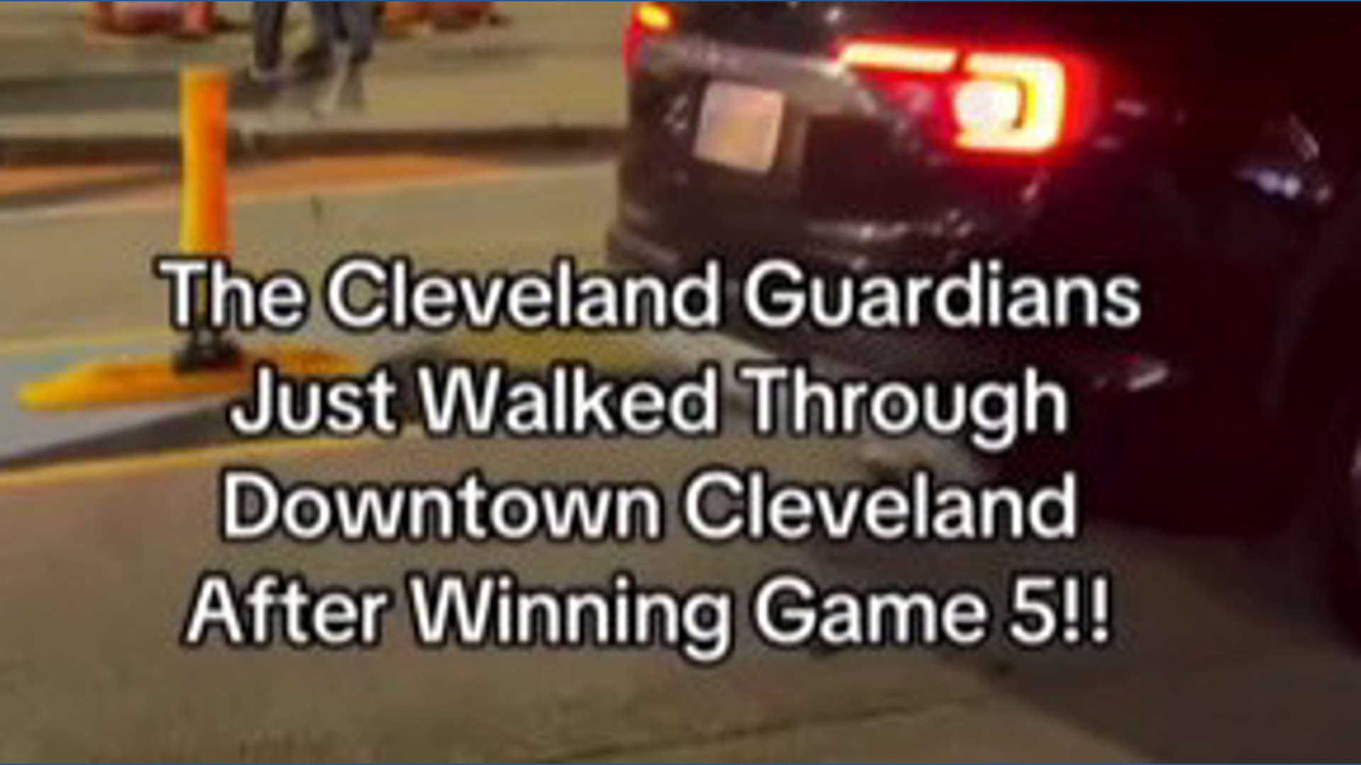 Guardians players stroll through Cleveland following ALDS Game 5 win