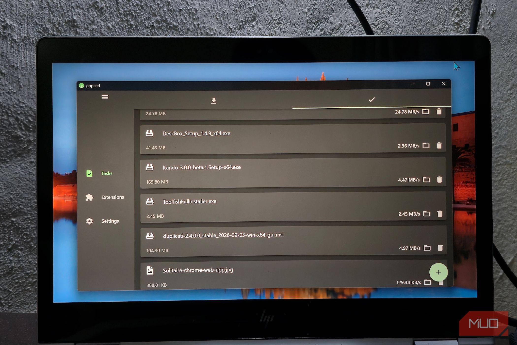I replaced my browser’s download manager with one app that handles ...