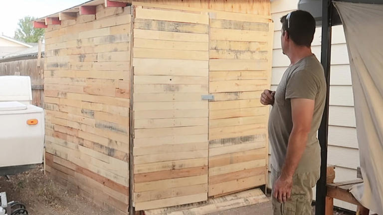 Upcycle old wood pallets into a lawn mower storage solution with a ...