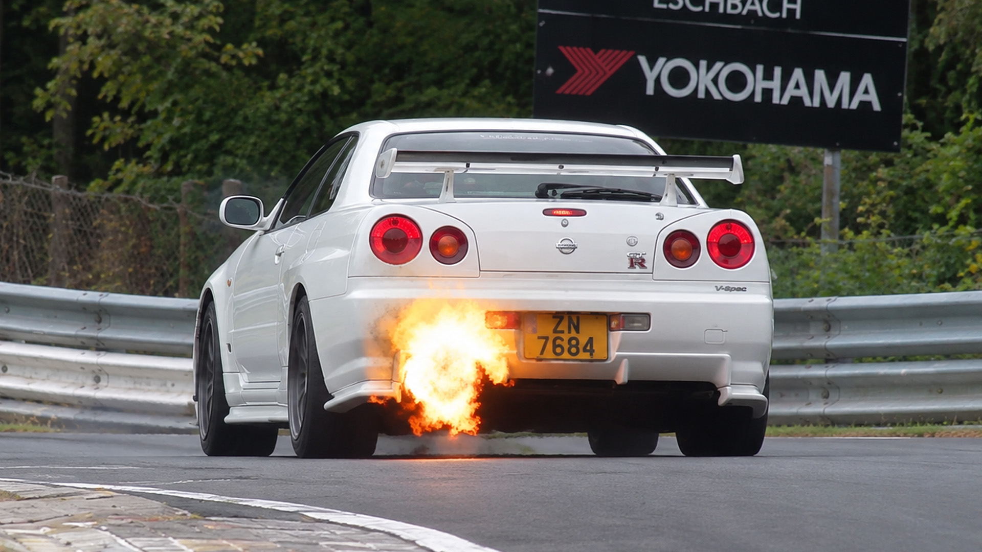Exhaust flames burst from tuned cars around the Nürburgring