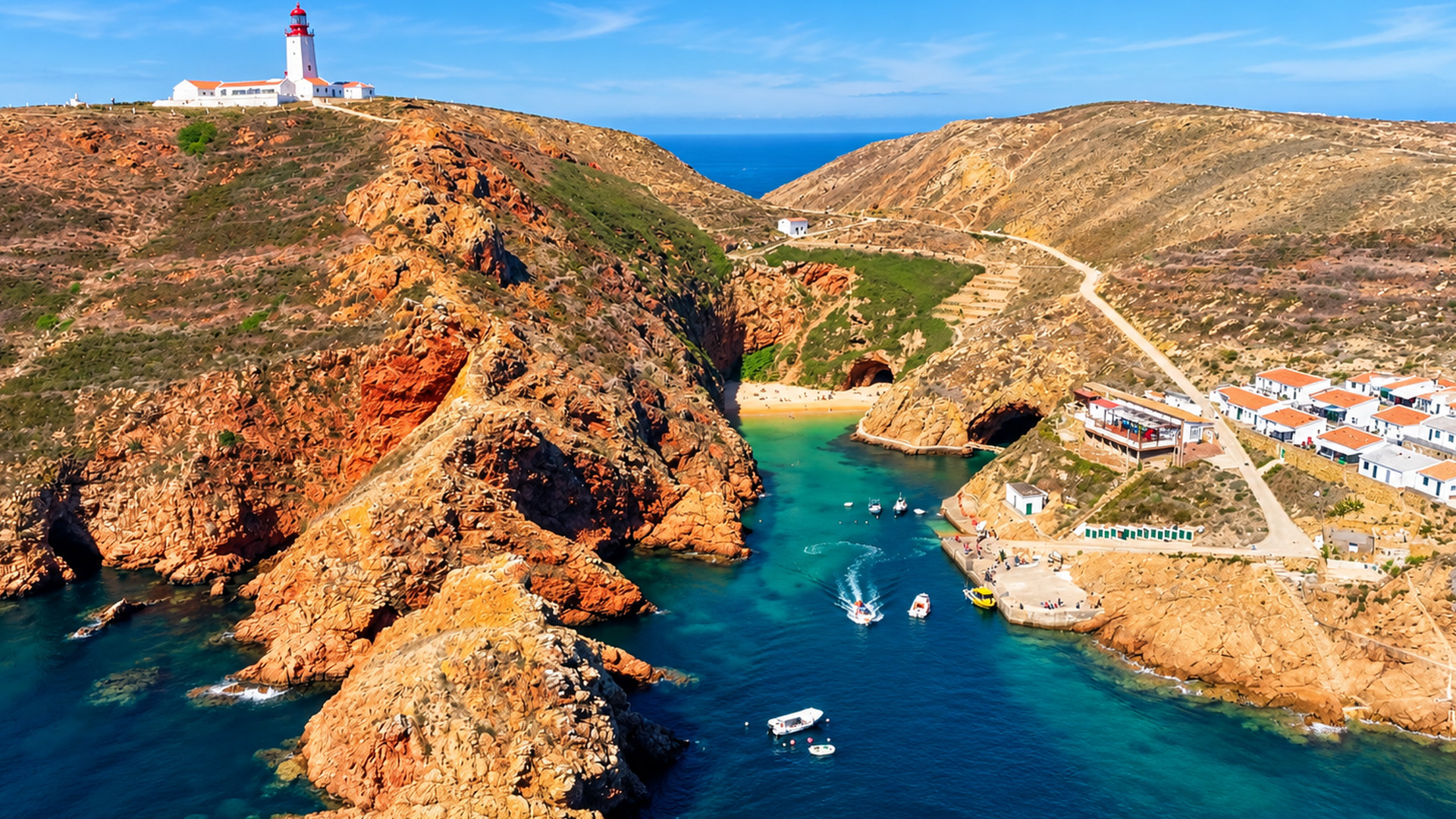 A small fishing village surrounded by orange cliffs