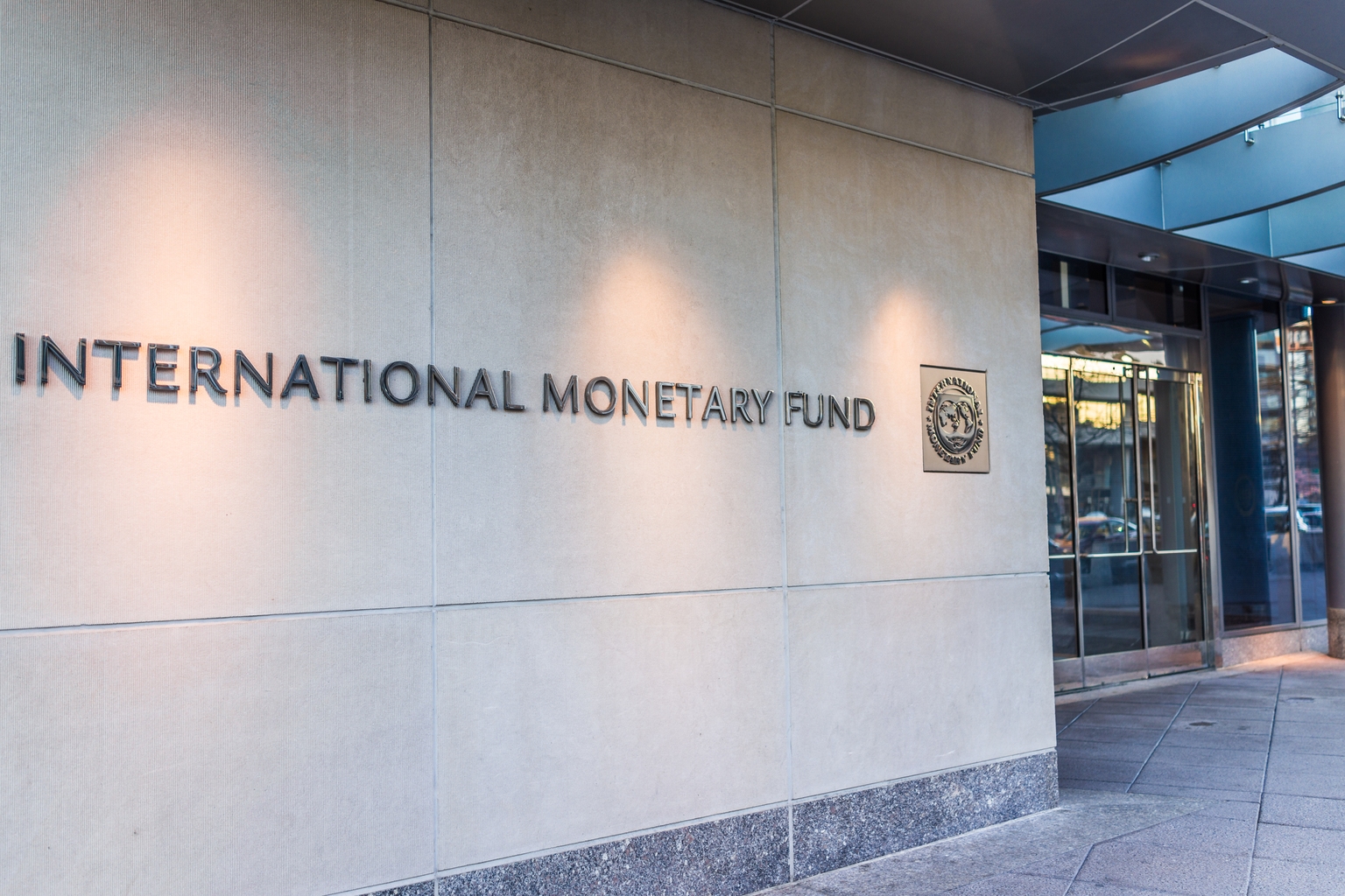 World economy holds up better than expected, but pressures build, IMF says
