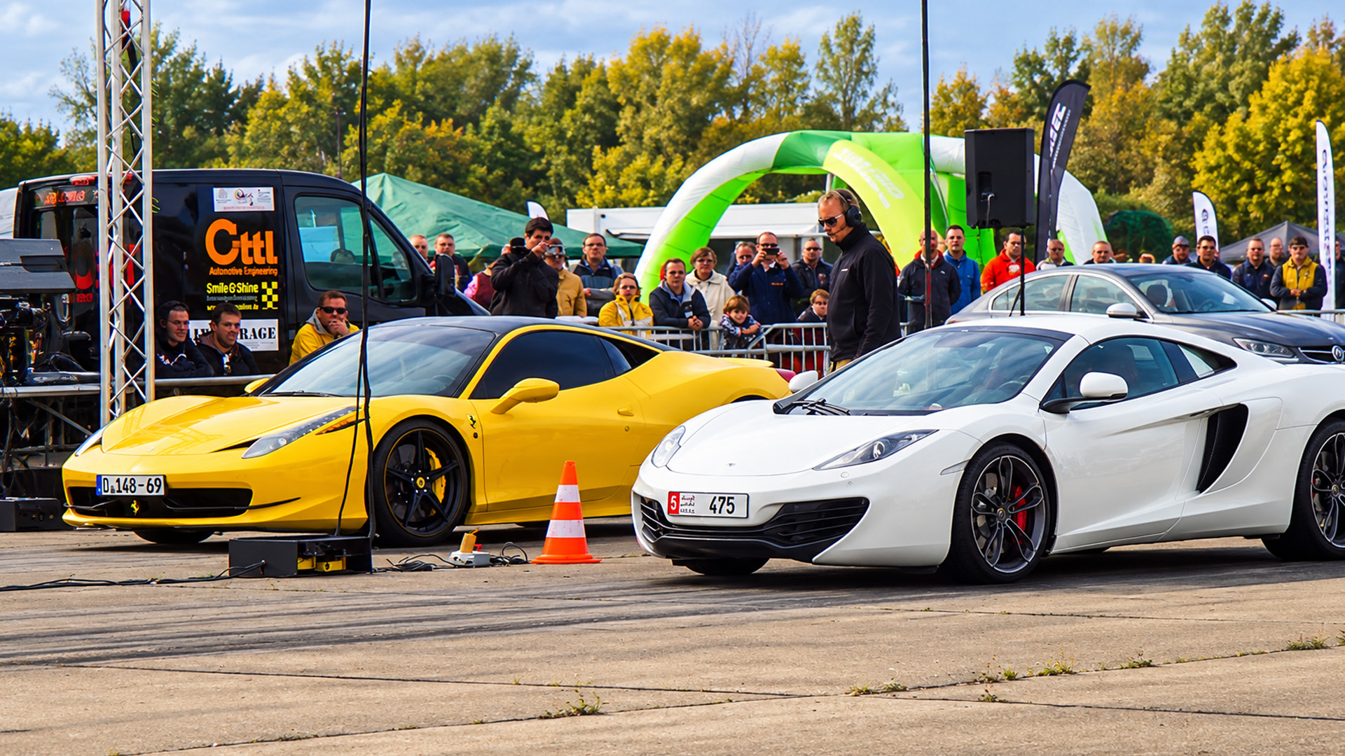 Ferrari 458 Italia faces a fierce McLaren drag race challenge