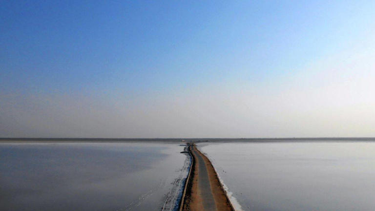 This white desert in India turns silver under the moon