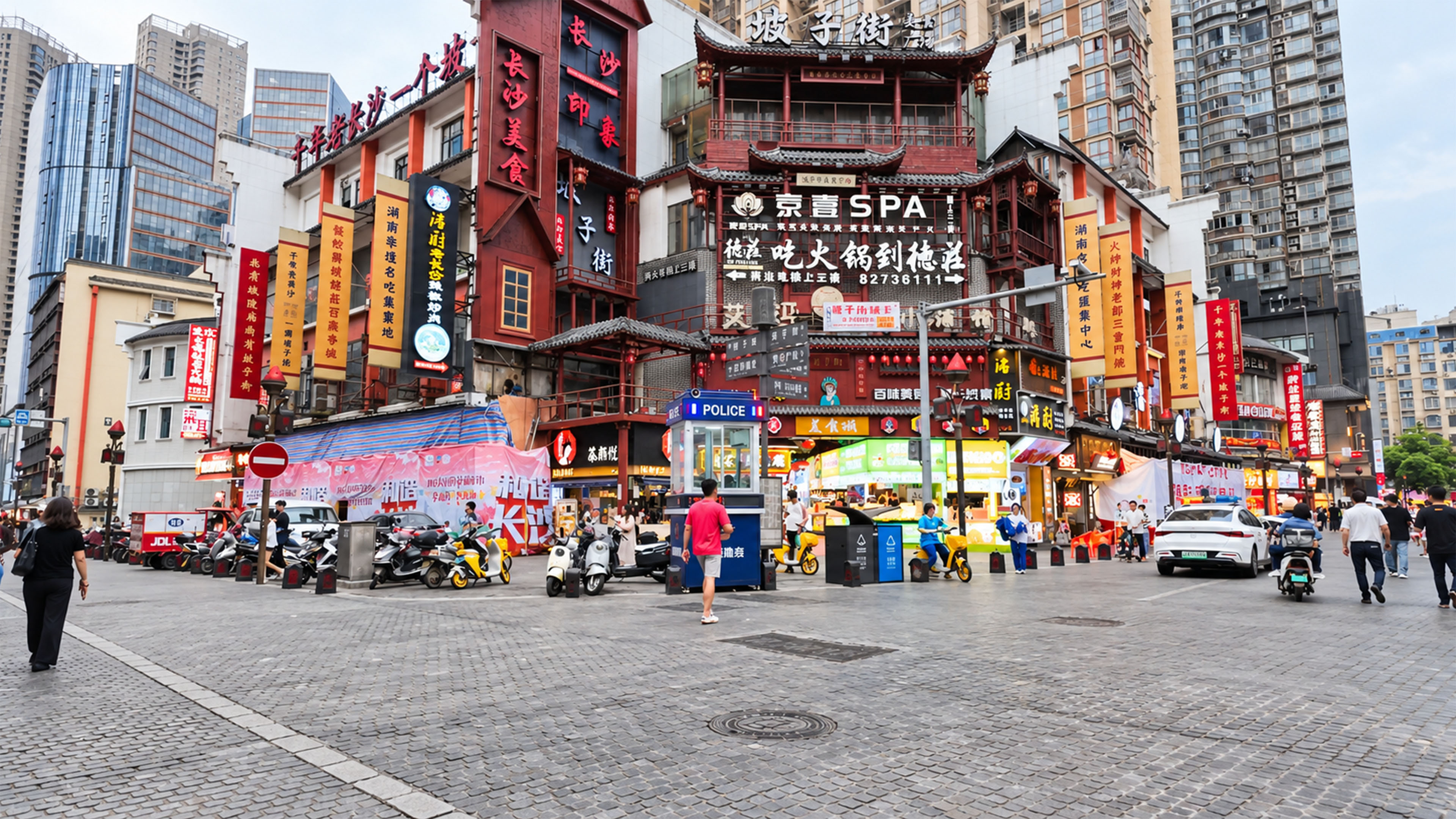 China packs traditional storefronts beneath modern high rise towers
