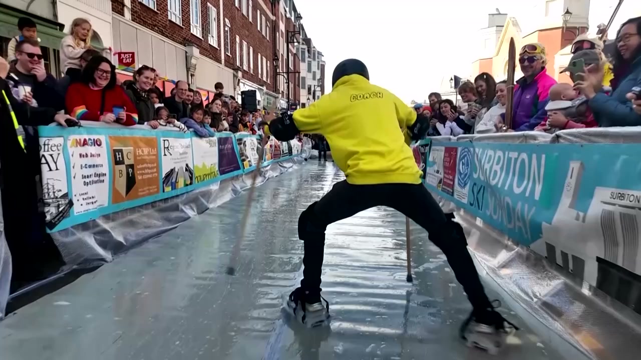 No snow, no problem: London suburb straps ice blocks to feet for ski event