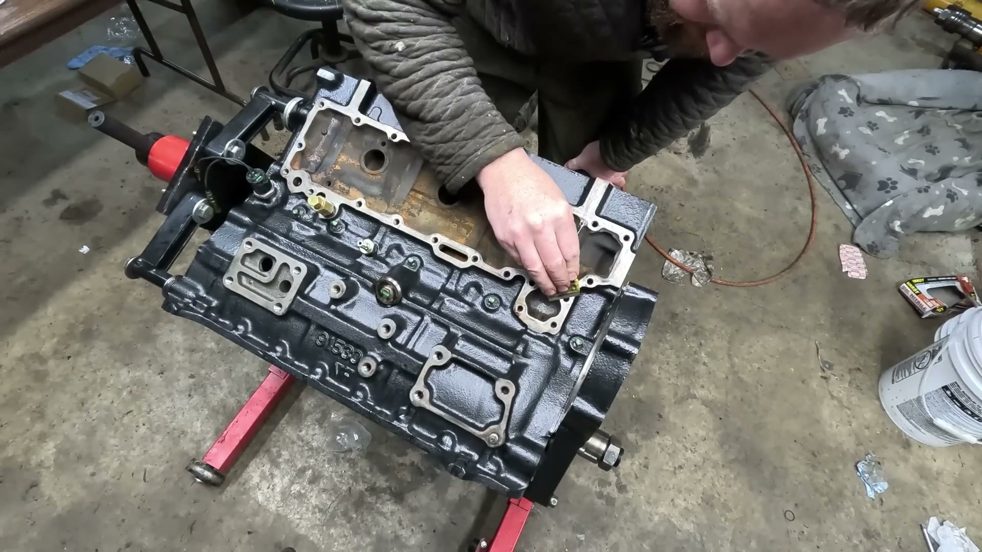 Preparing the front cover and oil cooler housing part 3