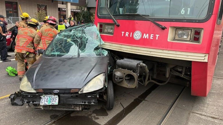 Driver taken to hospital with serious injuries after crash with MAX ...