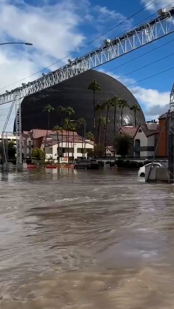 See Las Vegas streets become rivers inundated by Tropical Storm Rachel ...