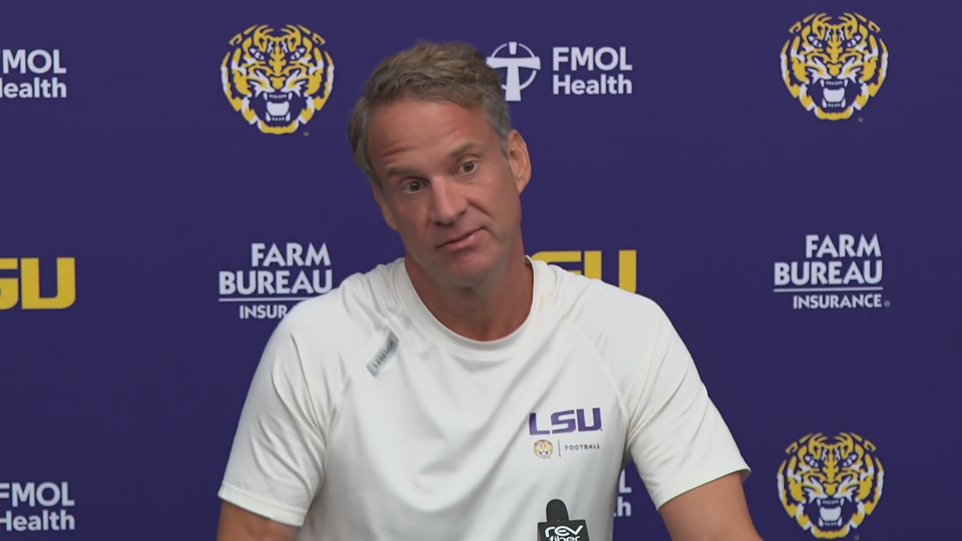 LSU head coach Lane Kiffin visitors' locker room being painted pink