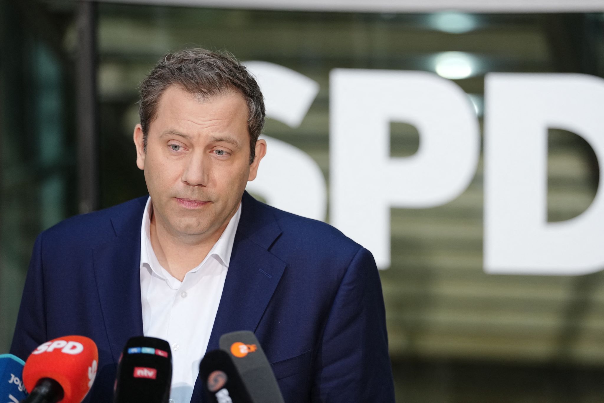 Under-pressure German coalition rocked by minister's resignation