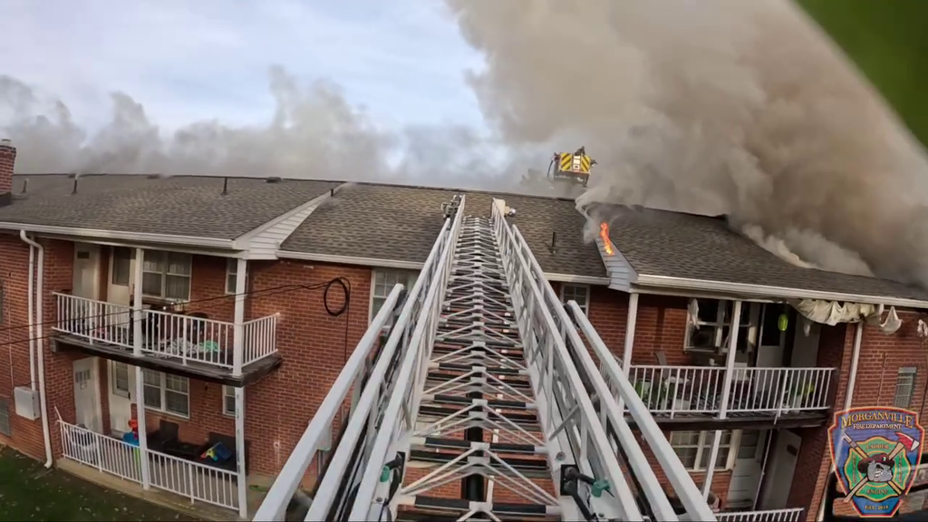 Body camera video shows New Jersey firefighter using chainsaw to cut ...