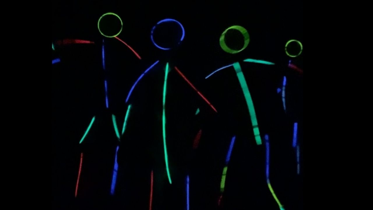 Family lighten lockdown with glow stick figure dance | Happily