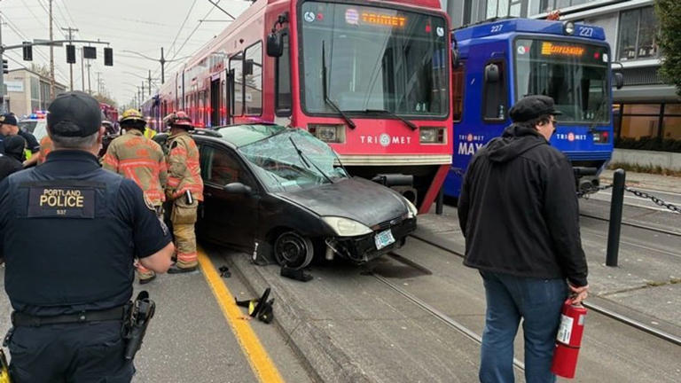 Driver taken to hospital with serious injuries after crash with MAX ...