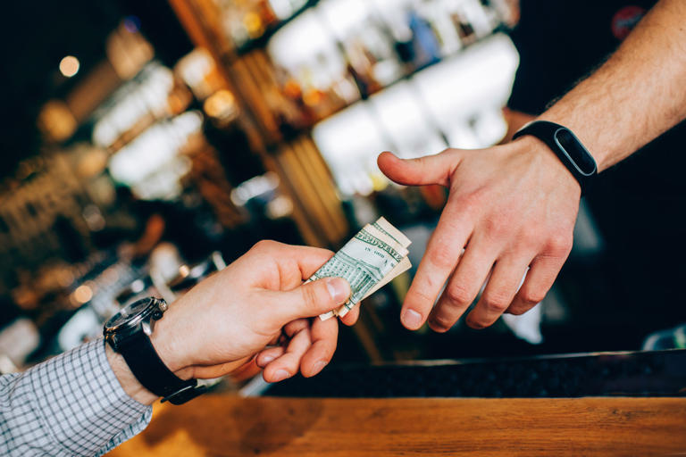 Americans tip because of a law passed in 1938 that deliberately left ...