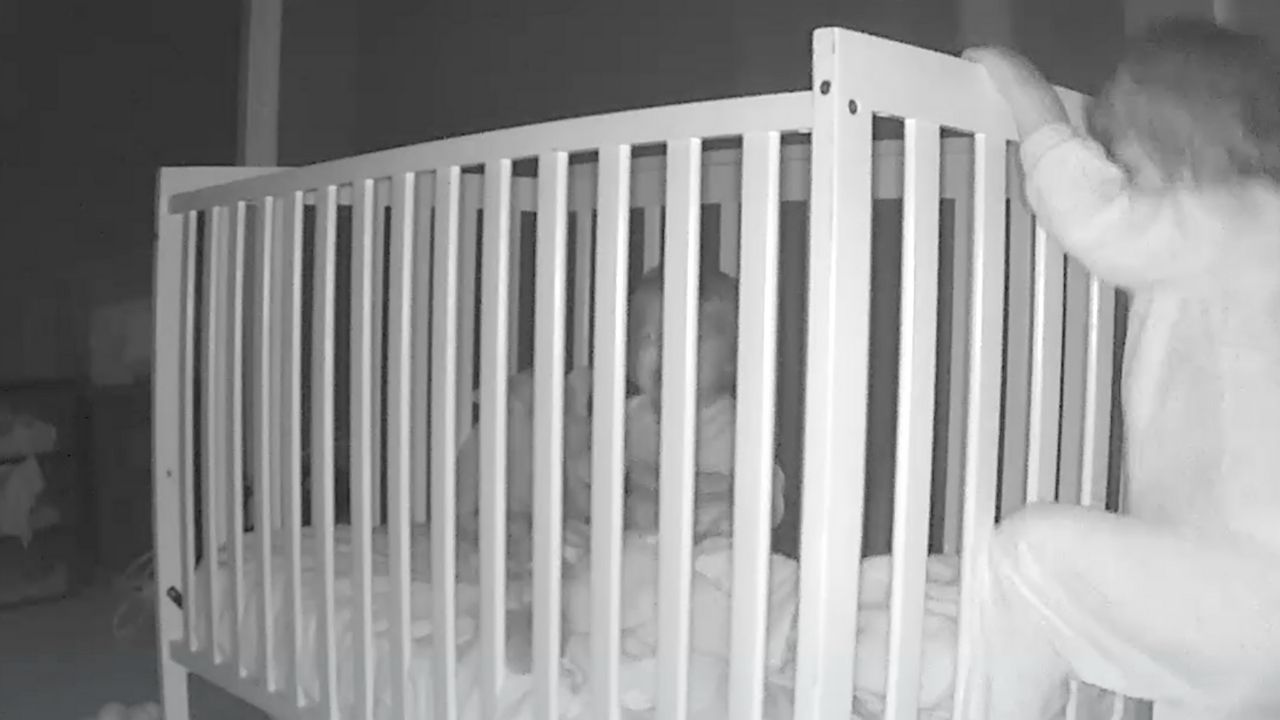 Boy escapes crib to comfort crying little brother back to sleep | Happily