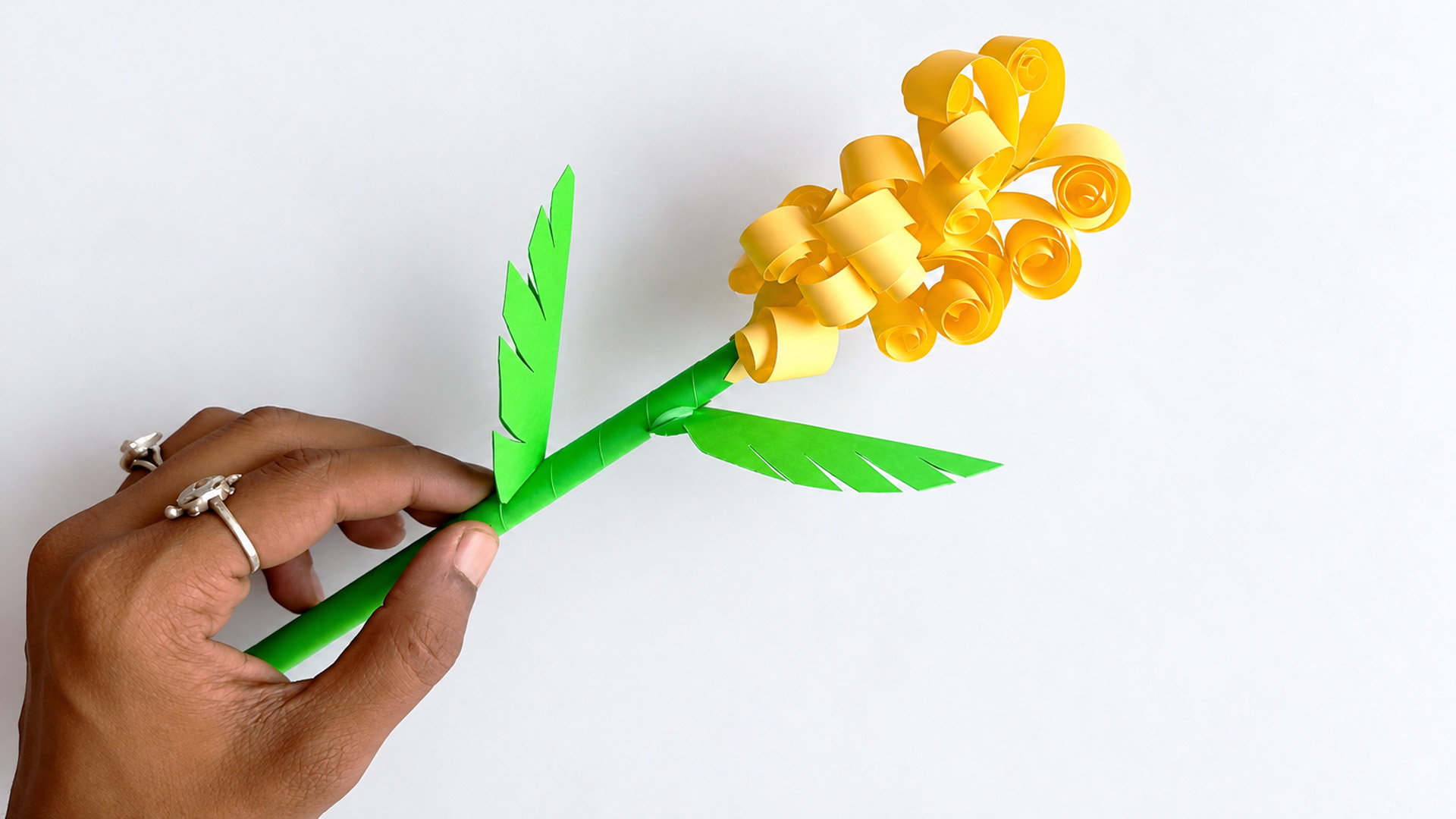 Easy DIY tutorial for crafting stick paper flowers