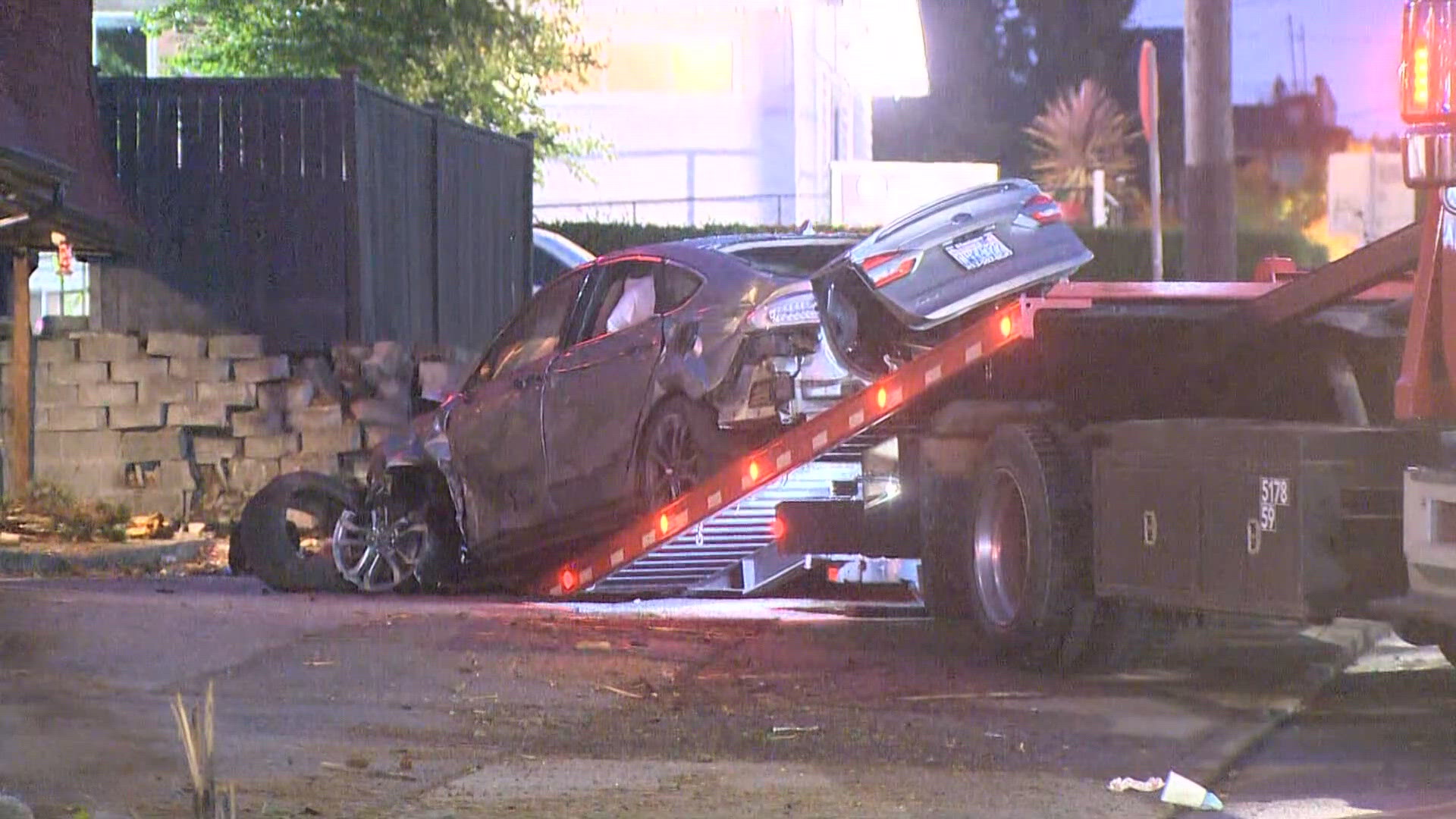 Driver hospitalized after crashing into north Seattle utility pole