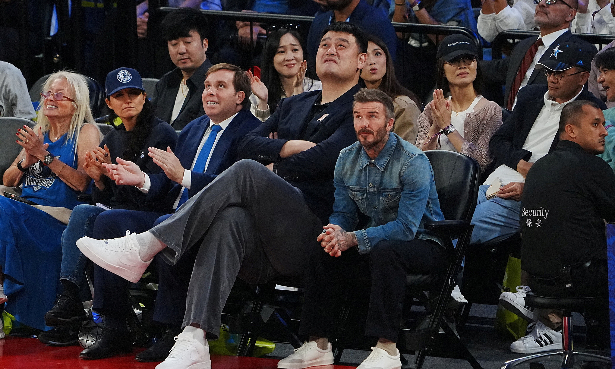 David Beckham looks tiny next to towering basketball legend Yao Ming at ...