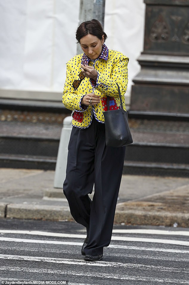 Zoë Foster Blake does her makeup on the streets in New York during a ...