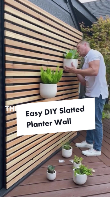 Easy DIY slatted planter wall for your outdoor space