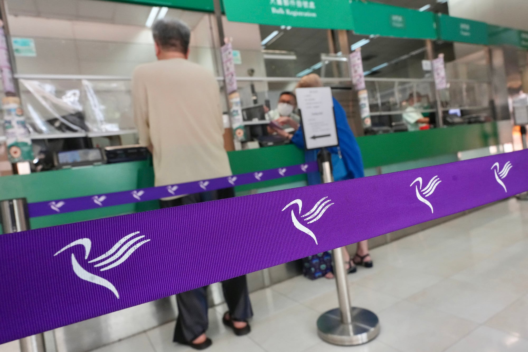 Hongkong Post contract staff to be prioritised for other civil service ...