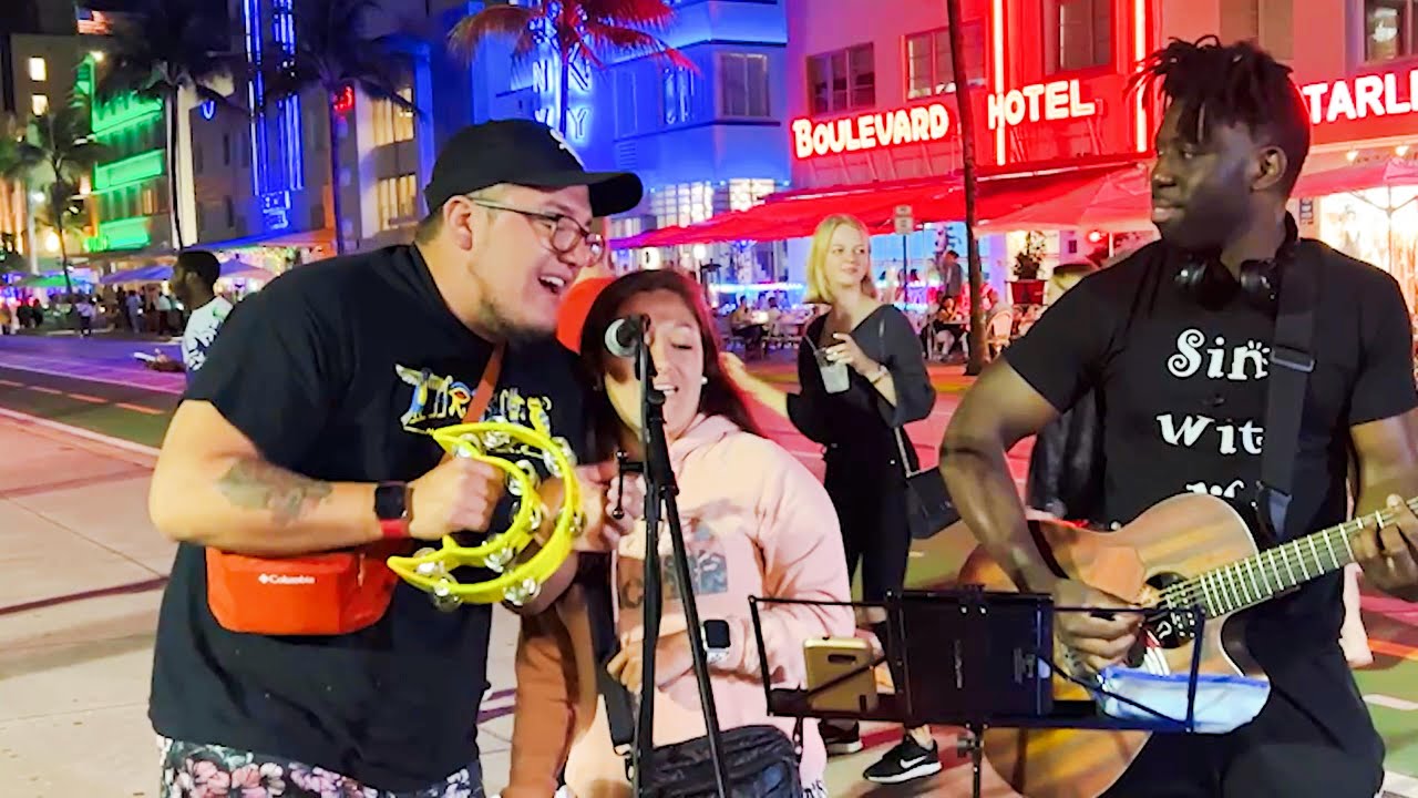 This random couple sings a Spanish song, then the party starts!