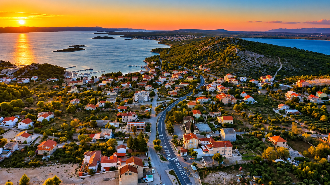 Croatia's beautiful coastal village at sunset along the Adriatic Sea