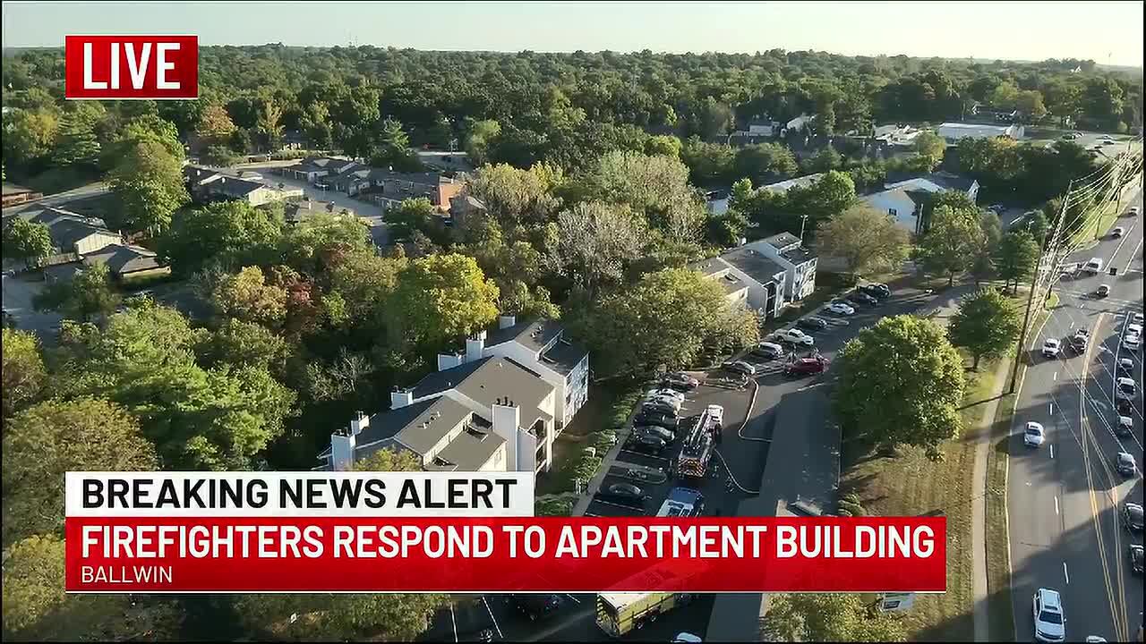 Firefighters battle apartment fire at Manchester complex