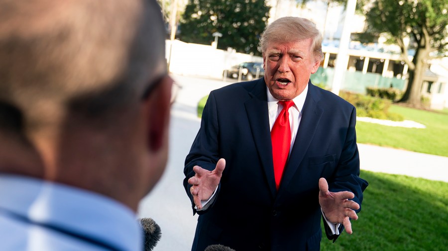 DOJ apologizes after campaign-style Trump ads air in violation of judge's order