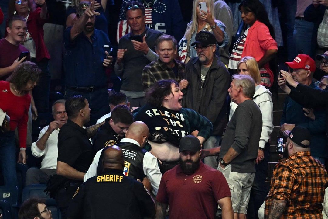 Female Trump protester punched in the face while president calls her ...