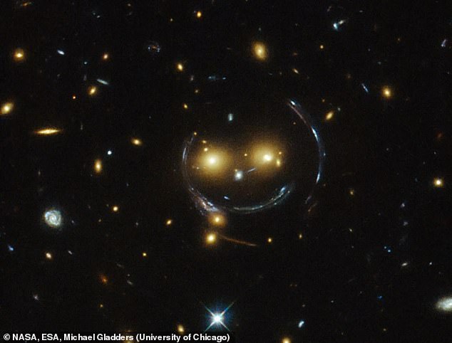 Say cheese! NASA reveals stunning image of giant cosmic smile created ...