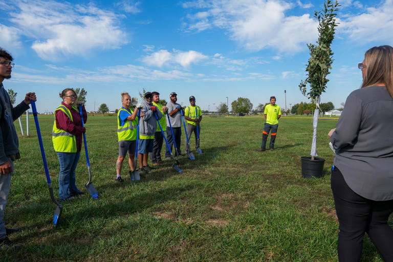 Owensboro Parks and Recreation plants trees at Waymond Morris Park