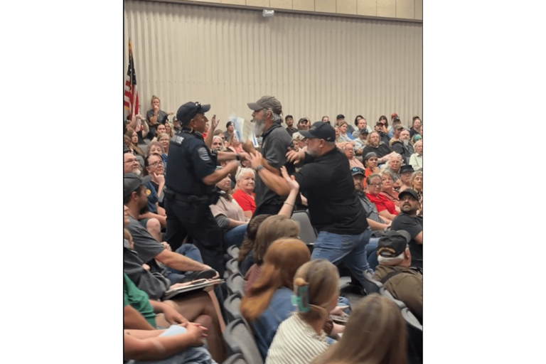 Man dragged from Iowa meeting for protesting Microsoft data center