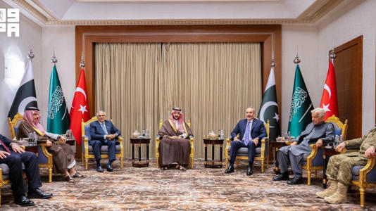 Saudi Arabia's Foreign Minister Prince Faisal bin Farhan Al Saud and Defense Minister Prince Khalid bin Salman, as well as ministers and military leaders from Turkey and Pakistan, attend the Mecca defense pact meeting between the three countries in Riyadh, on October 5. - Saudi Press Agency/Reuters
