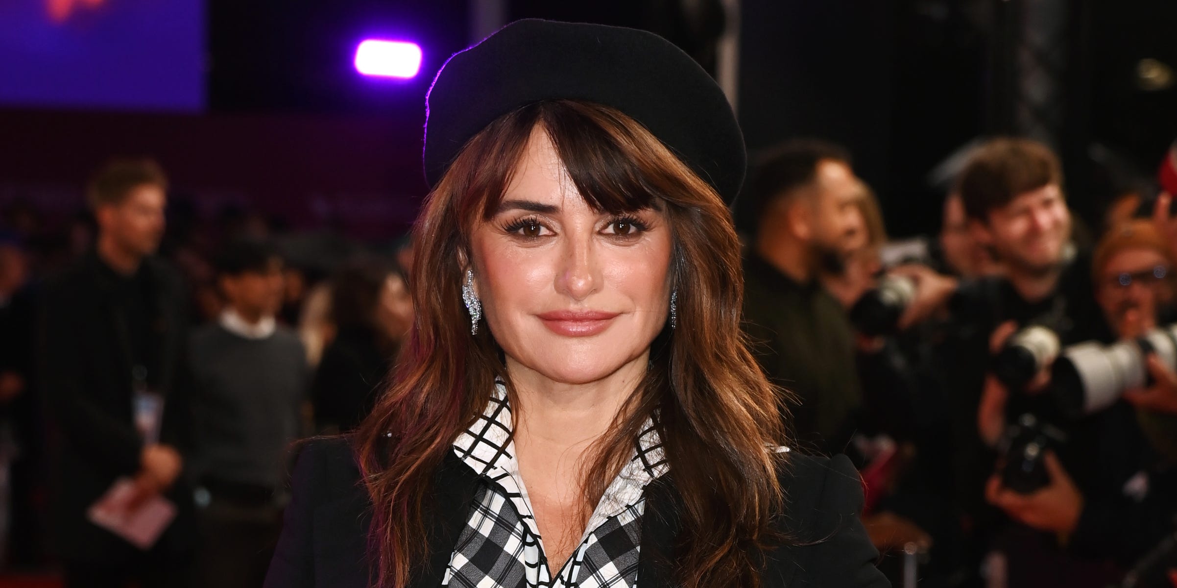 Penélope Cruz spices up her mod-inspired suit with a beret
