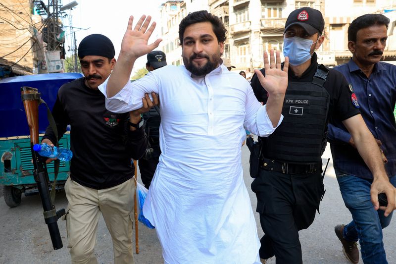 Pakistan police fire tear gas, rounds at Imran Khan backers, party says