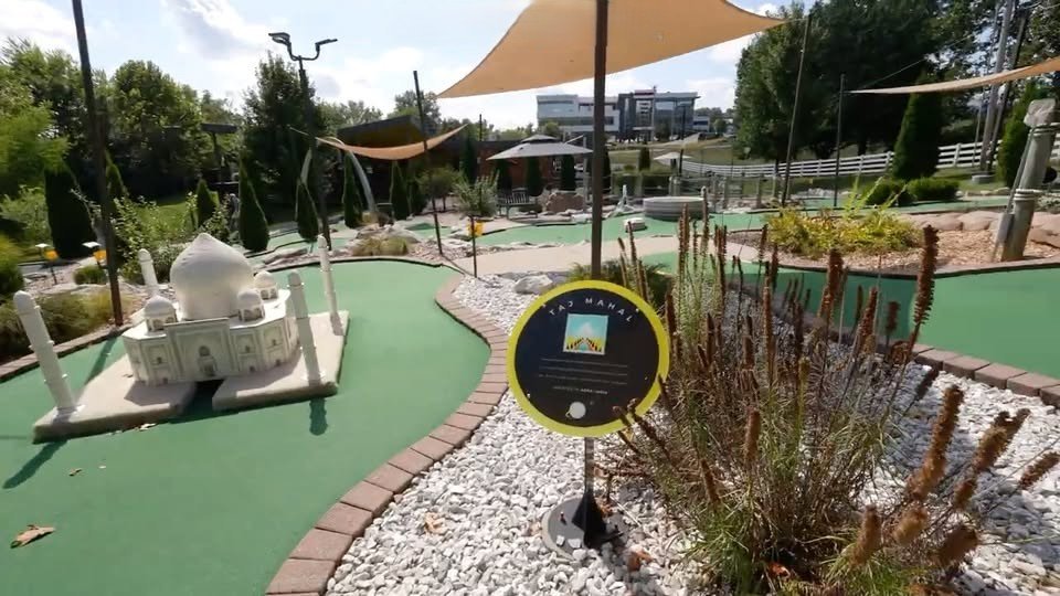 Mini golf course with a world tour theme
